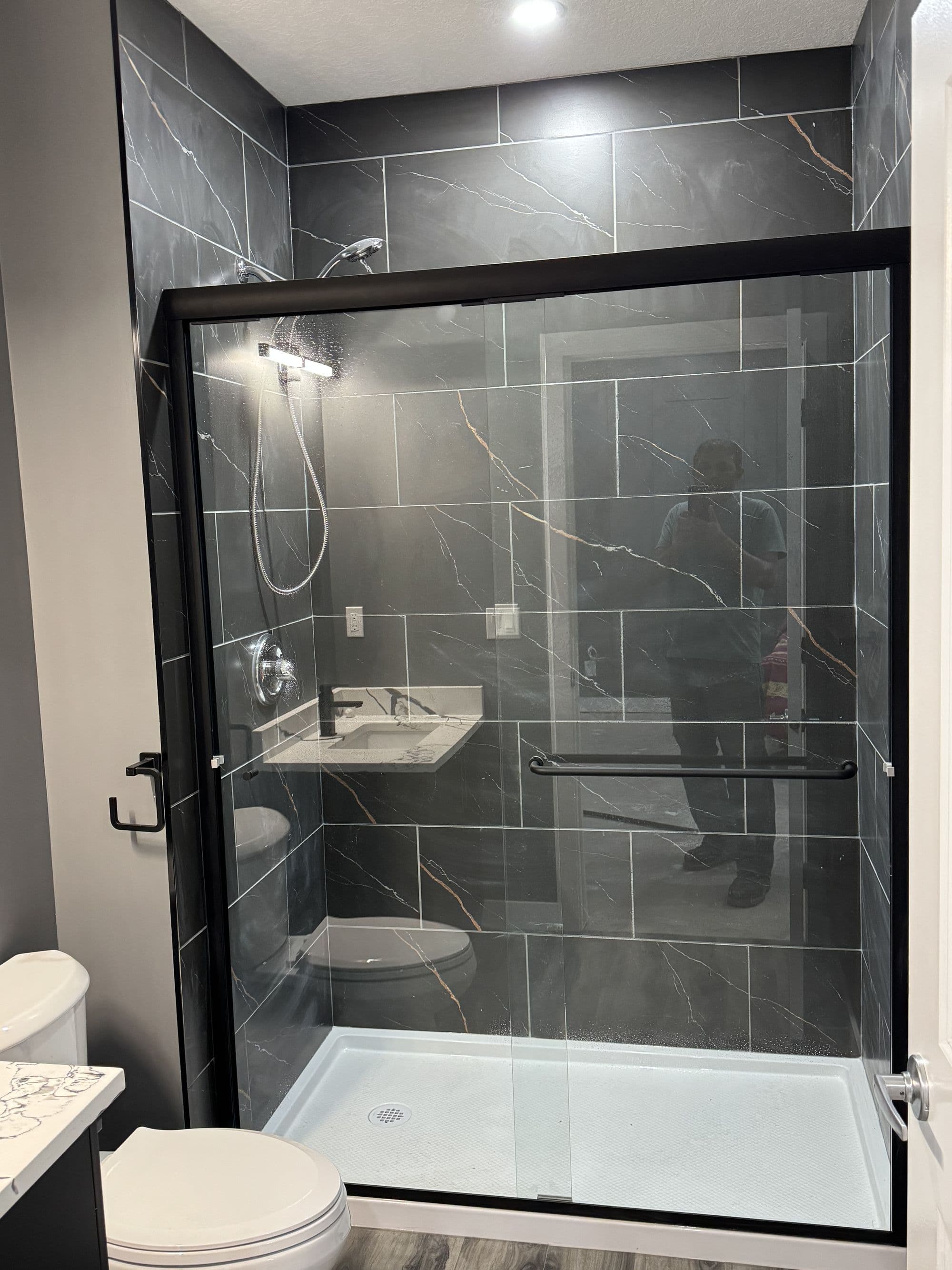 Custom bathroom renovation in Calgary with premium fixtures and elegant tile work